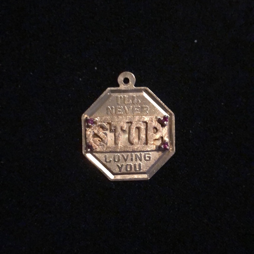 VINTAGE 14KT GOLD AND RUBY PENDANT/CHARM